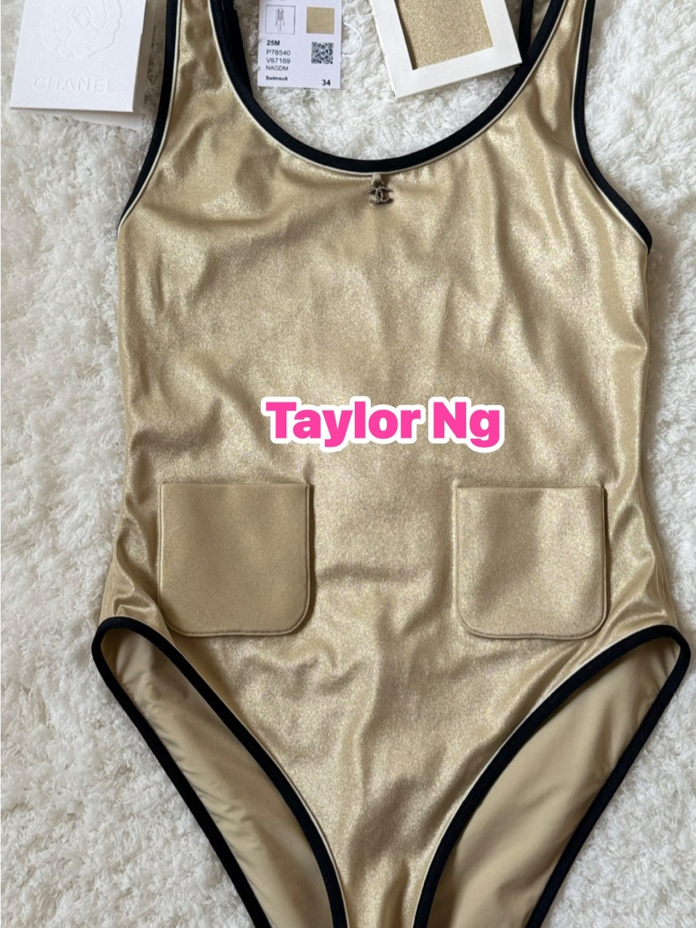CHANEL Gold Shimmer One-Piece Swimsuit with Black Trim and Front Pockets